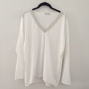 Biscote white long sleeve embellished top